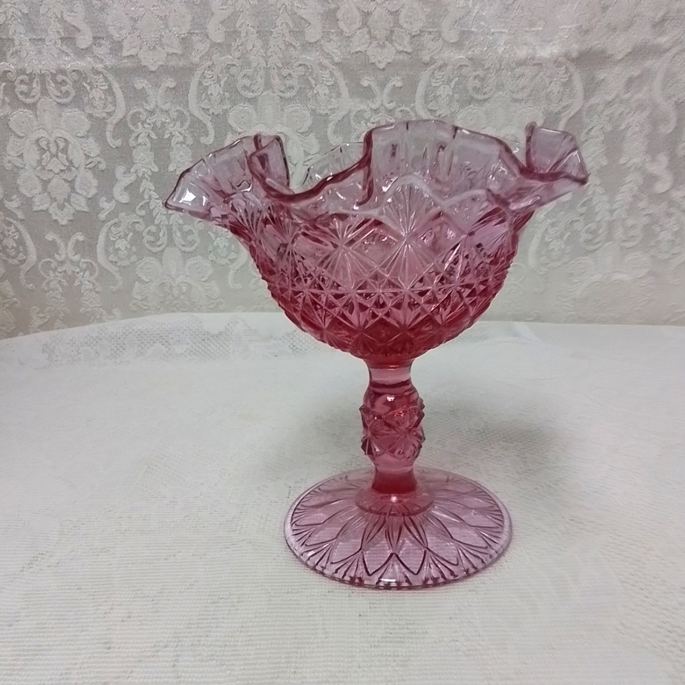 Fenton pink ruffled edge compote candy dish with pedestal.